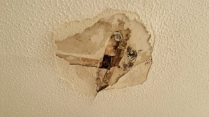 Artex ceiling repair required due to escape of water from bathroom