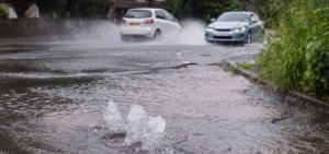 Burst water main causing flood damage