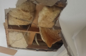 collapsed ceiling repair required after burst pipe in loft